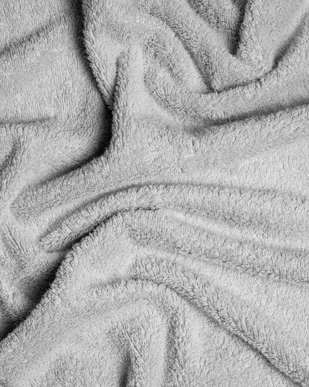 Close-up of a Veroma bamboo cotton gym towel showing soft, absorbent fabric and detailed stitching.