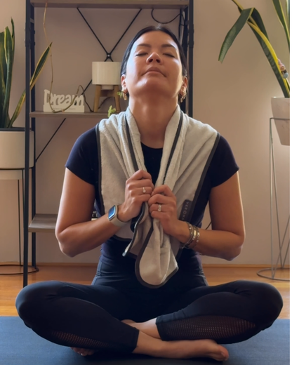 Veroma bamboo cotton gym towel spread on a workout bench, showing its soft texture and absorbent material for fitness use